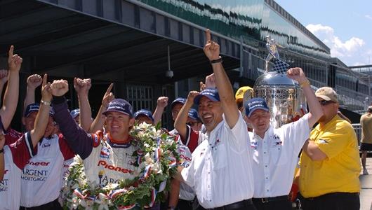 Buddy Rice, left, and Rahal-Letterman Racing co-owner Bobby Rahal celebrate with the team.