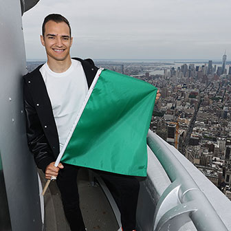 Alex Palou with the Green Flag