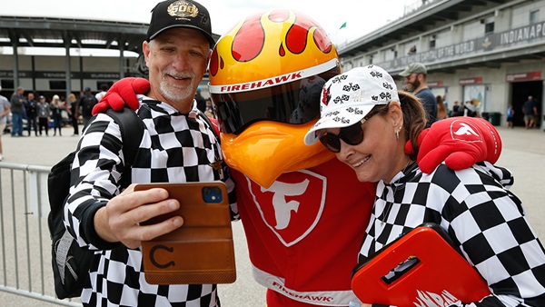 Two fans with the Firestone Firehawk