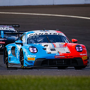 A car races at the Indianapolis 8 Hour