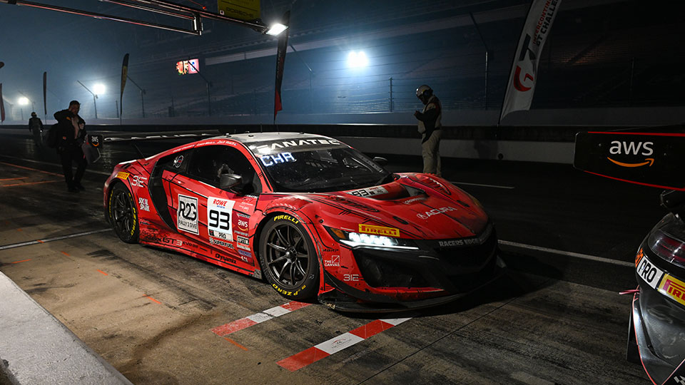 A car races at the Indianapolis 8 Hour