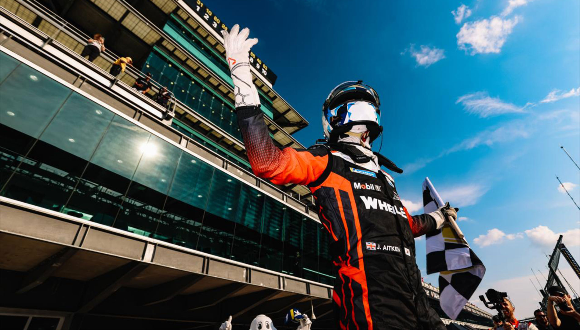 Jack Aiken celebrates winning the IMSA TireRack.com Battle on the Bricks.