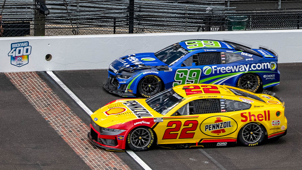 Drivers cross the yard of bricks