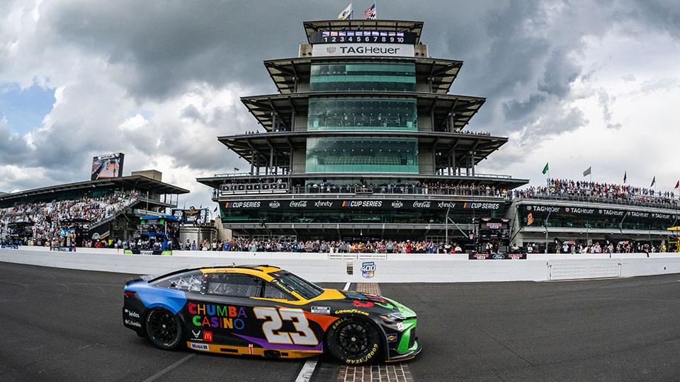 Bubba Wallace crosses the yard of bricks
