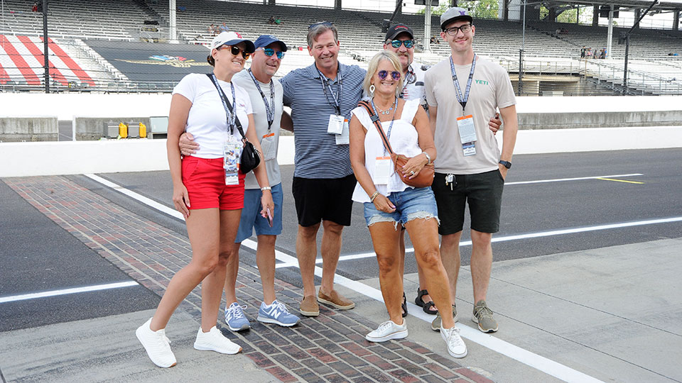 A group enjoys the pit pass