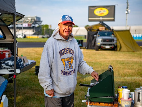 A man camps at IMSA Weekend