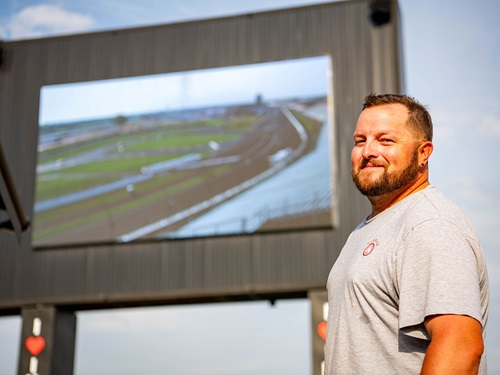 A man watches the big screen
