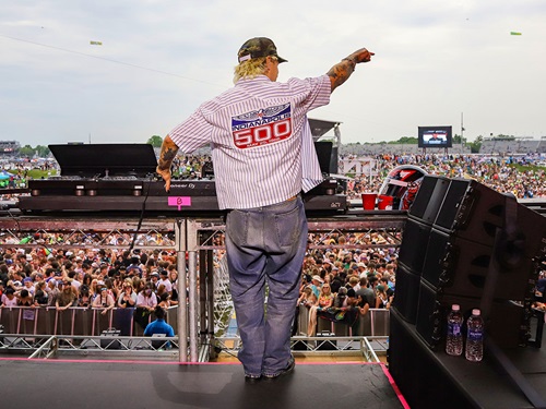 A DJ plays to the crowd of the Snake Pit