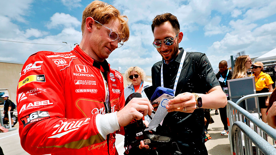 Jacob Abel signs an autograph