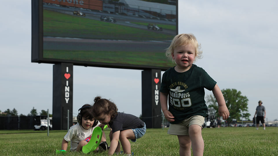Children play in the In Field of IMS