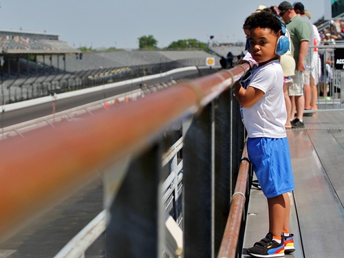 A child looks upon the track at Indianapolis Motor Speedway