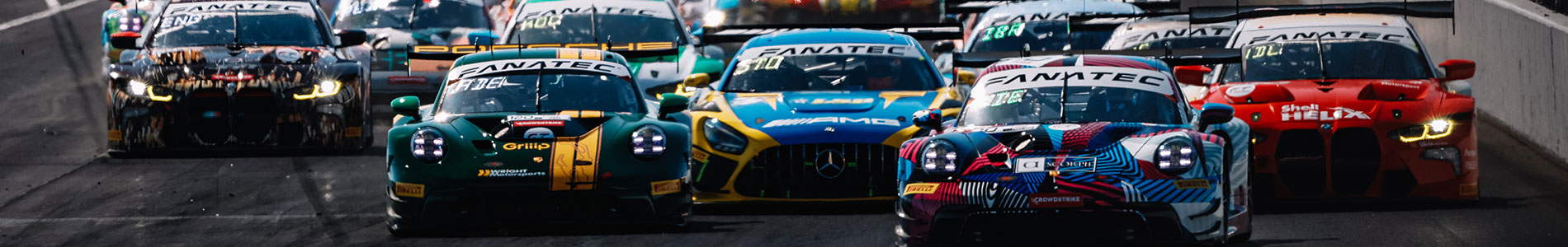 Cars race the Indy 8 Hour