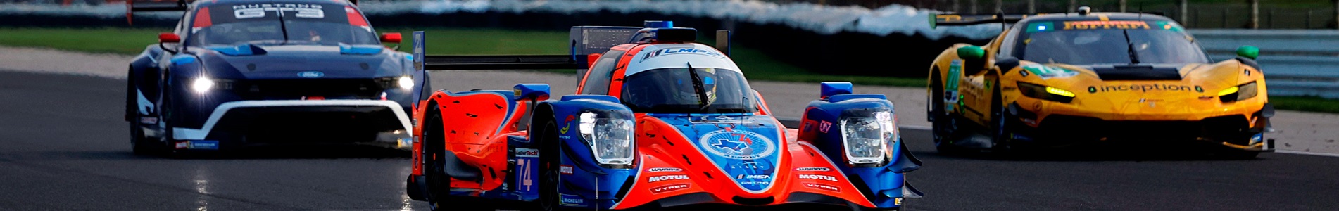 Cars race at the TireRack.com Battle on the Bricks