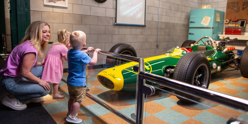 A family enjoy the Indianapolis Motor Speedway Museum